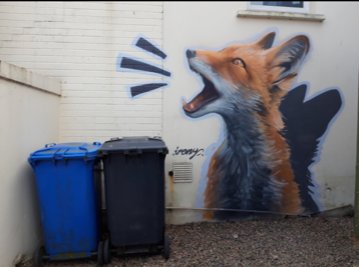 Graffiti wall art of fox